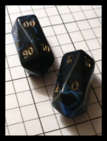 Dice : Dice - 10D - Crystal Caste Bullet  Black and Blue Swirl with Gold Numerals Gen Con 2009